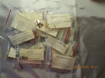 16 pkgs Grieger's Inc Pasadena Ca earring backs, Shepherd hooks etc Surg Steel
