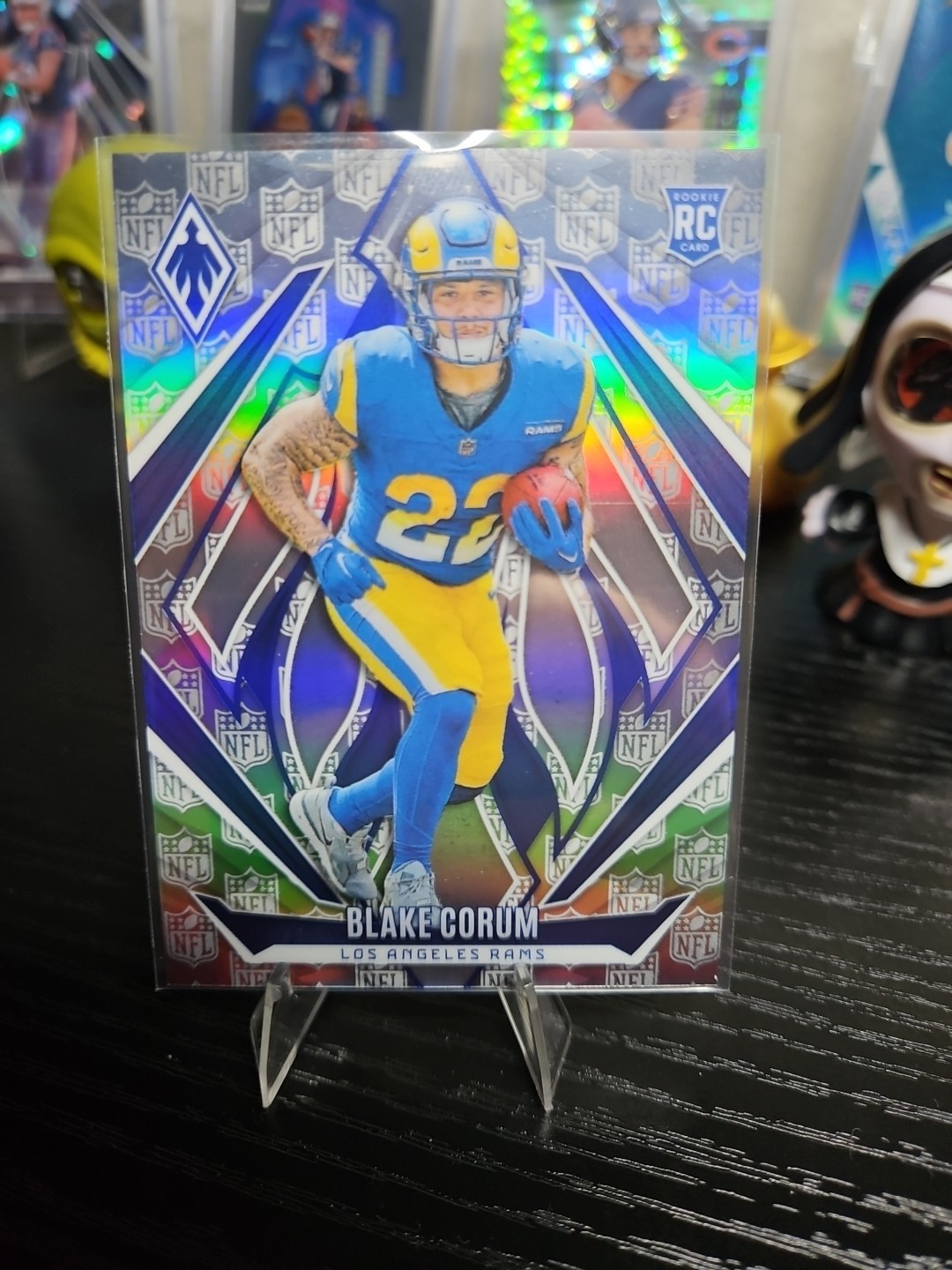 2024 Panini Phoenix - Rookies Blake Corum #158 NFL Shield /150 (RC)