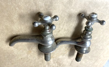A Pair of Porcelain Brass Nickel Plated Tub Faucet Handles