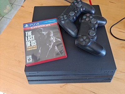 Sony PlayStation 4 Pro 1TB Console - Black w/ The Last of Us, 2 controllers