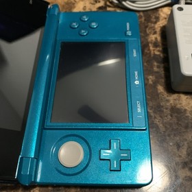 Nintendo 3DS Handheld System Aqua Blue 5 Games Charger 2GB Memory Card Case