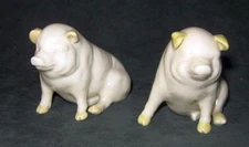 2 Belleek Ireland Porcelain Pigs green lettering no. 0857