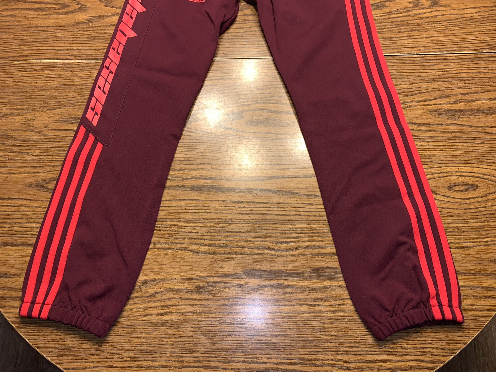 red calabasas track pants