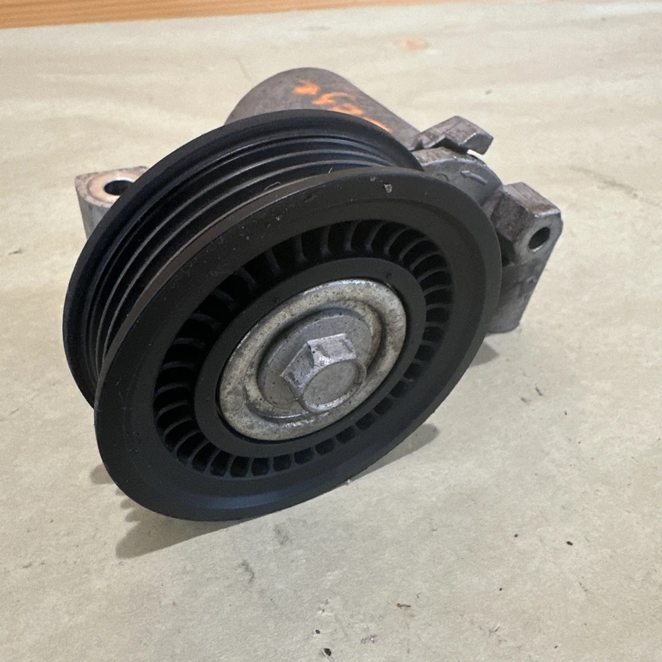 Tensor de correa de motor Ford 2,0 L 2,5 L Edge Fusion Transit Connect OEM DS7Z6A228A Foto 2 de 4