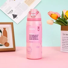 owala 32oz vacuum Insulated stainles steel water cup with leakproof straw lid​.