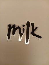 MILK  image displays a die-cut vinyl sticker featuring the word "milk"