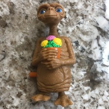 Vintage 1982 E.T. Extra Terrestrial Wind Up Toy Alien Holding Flowers Works