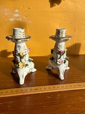 Pair of Dresden floral and gold porcelain style candlesticks in mixed condition