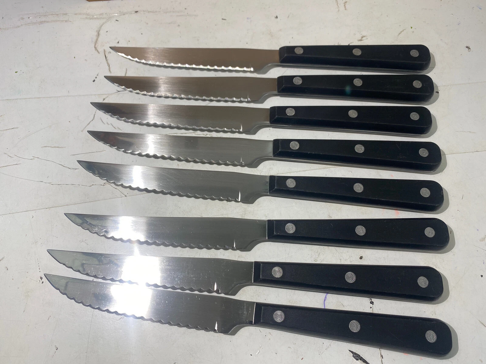Eight Piece Set of Dinner Stainless Steel Serrated Steak Knives