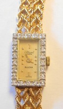 Bulova Ultime 14K Yellow Gold Diamond Case Band Ladies Quartz Wrist Watch