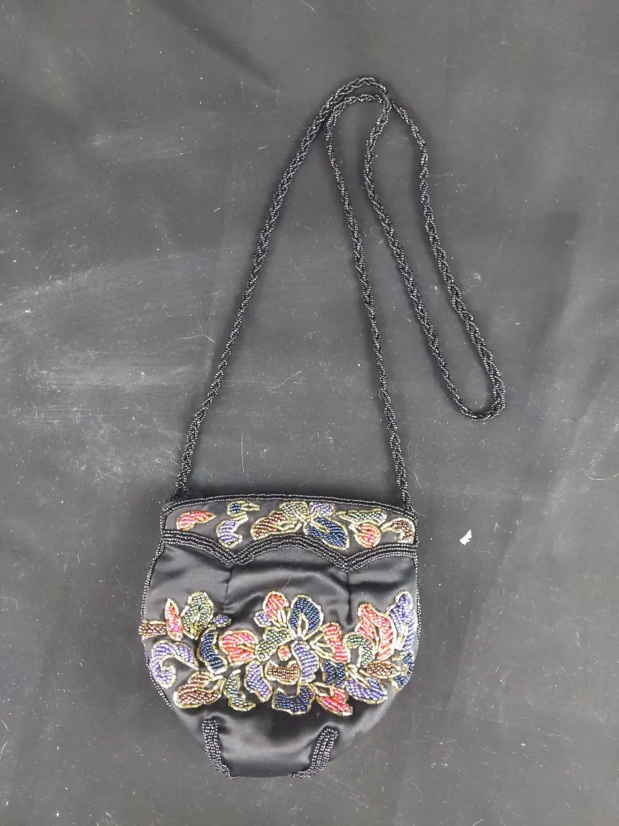 La Regale mini bag purse with black beaded handle.