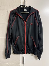 vintage Puma black and red track jacket.