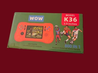 The Item Shown Is A K36 8-bit Rocker Game Console with The Following Box