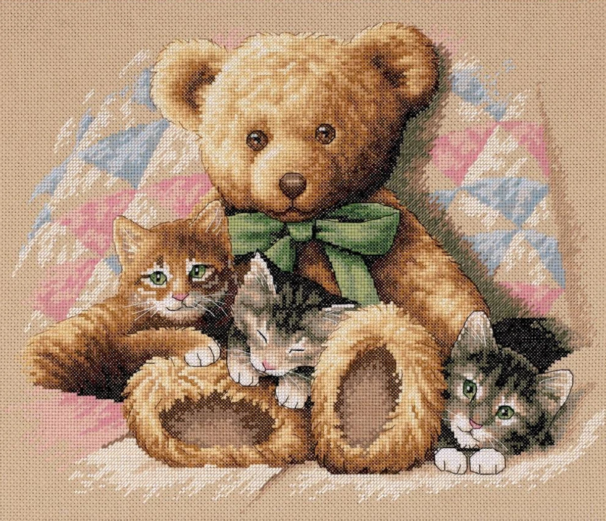 Kitten and top teddy bear