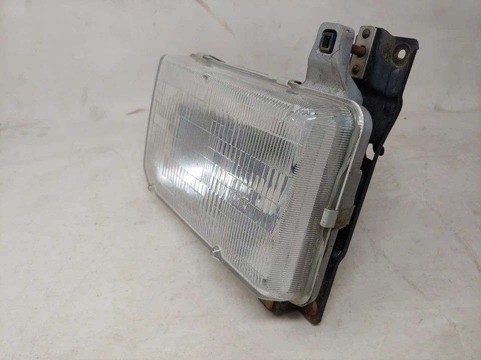 Faro lado izquierdo del conductor OEM 1987 88 89 90 91 92 93 94 95 Nissan Pathfinder Foto 4 de 4