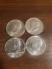 Lot of 4 Beautiful Uncirculated 1964 John F Kennedy Silver Half Dollars