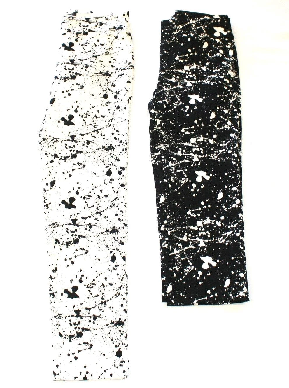 (2) New PURE AMICI Paint Splatter Ankle & Capri Pants Women SMALL S Black White
Opens in a new windo
