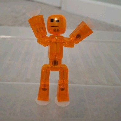 Stikbot Transparent Orange Adjustable Poseable Plastic Figure with Suction Cups