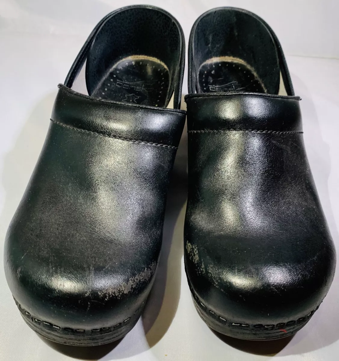 Silver dansko best sale clogs