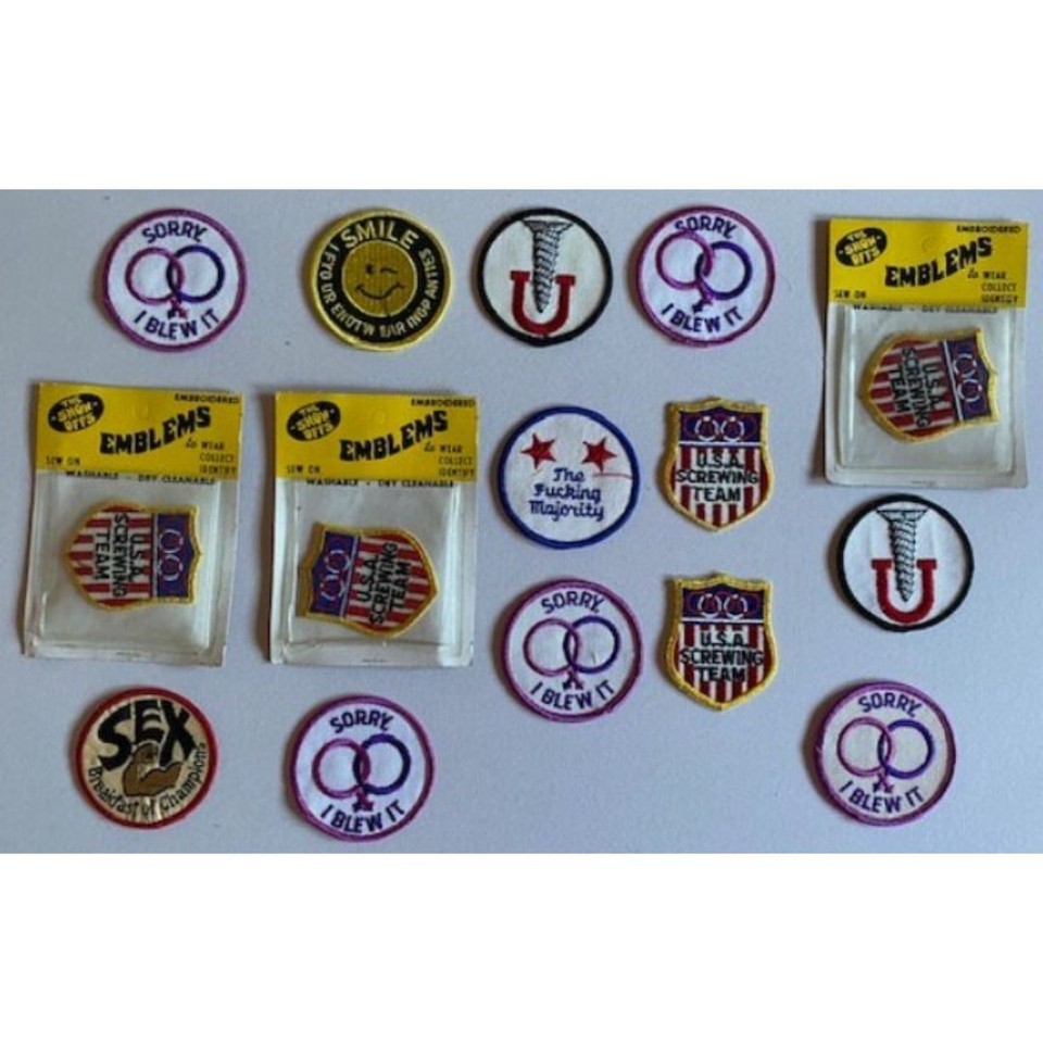 A full set of 15 genuine 70s/80s risqué iron-on patches — a rare, tactile time capsule of pre-internet adult humor.