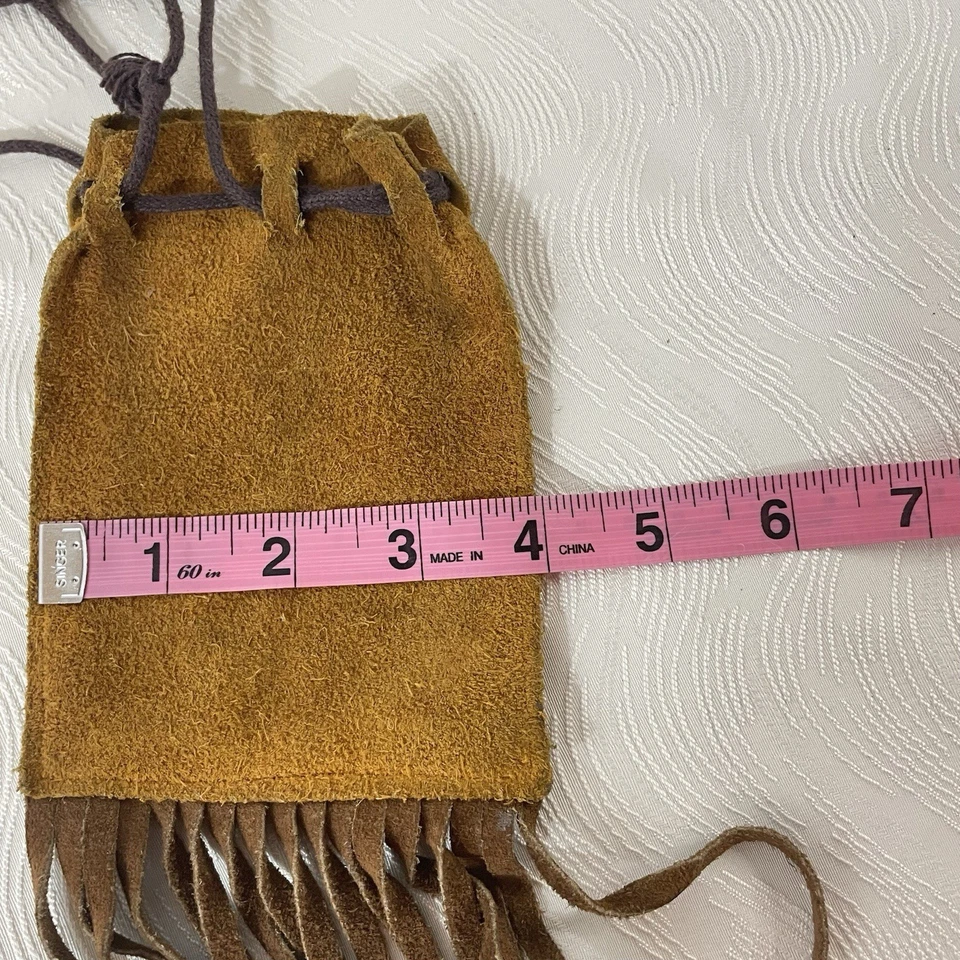 Bolso vintage de gamuza marrón con cordón y flecos Foto 3 de 4