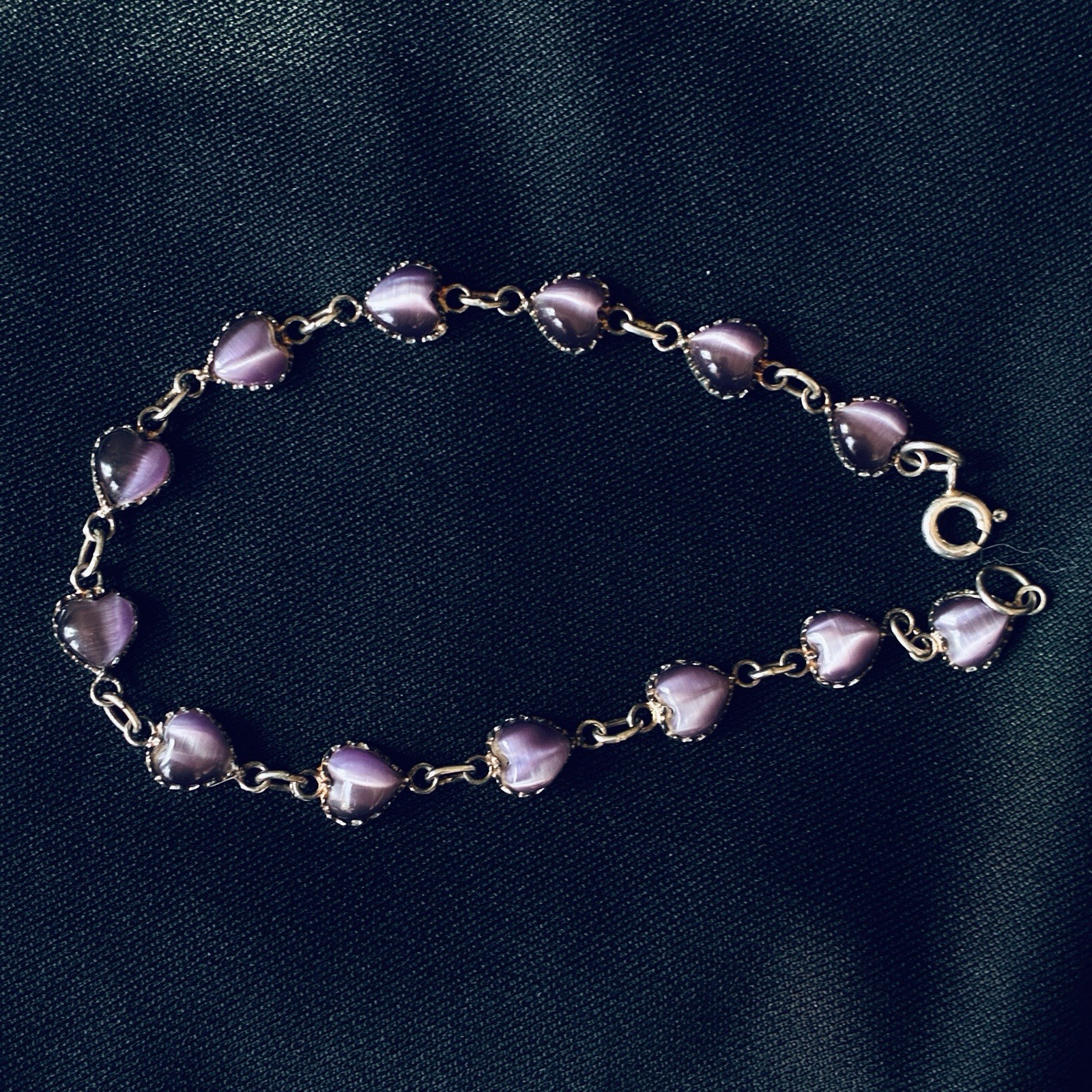 This charming bracelet features heart-shaped bead… - image 1