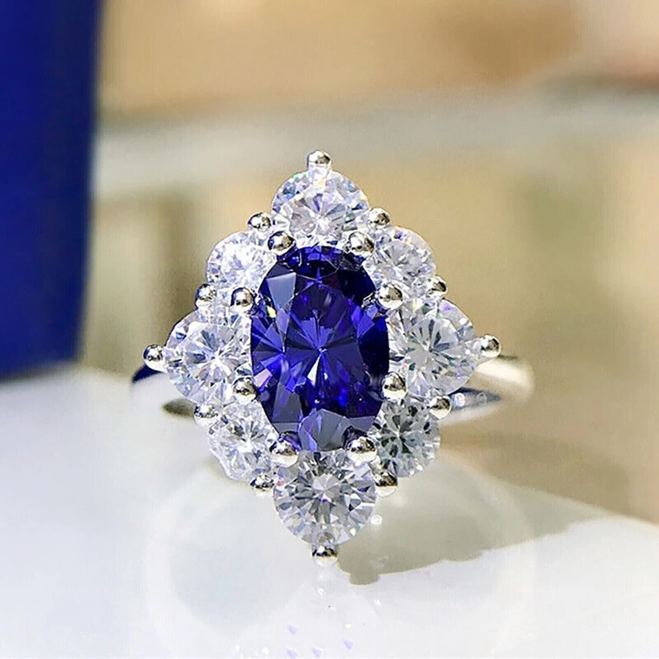 Anillo de compromiso para mujer de zafiro simulado de corte ovalado de 2,00 quilates enchapado en oro blanco de 14 quilates Foto 2 de 4