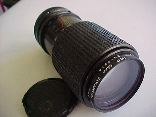 Tokina Canon FD mt. 80-200mm f4 macro zoom w/caps & filter.    (box 86)