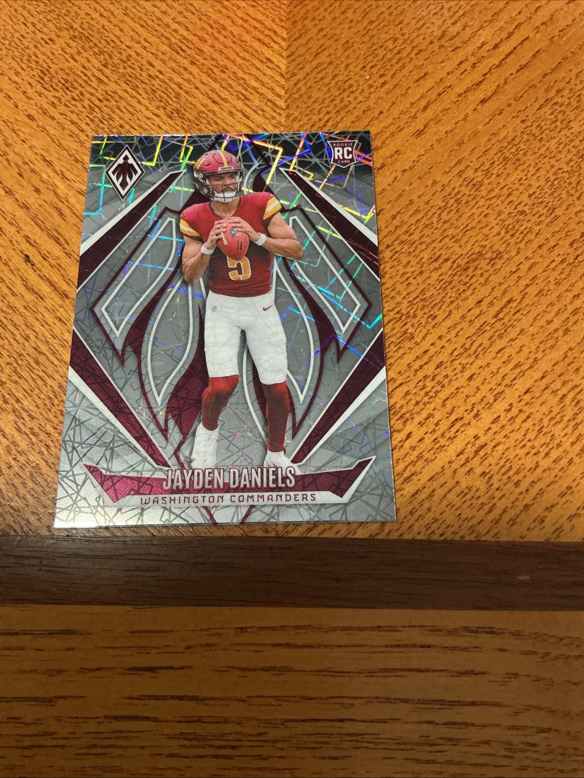 2024 Panini Phoenix - Rookies Jayden Daniels #198 Lazer (RC)