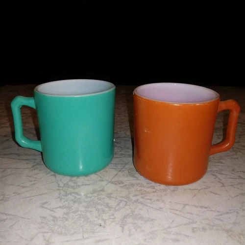 Pair Hazel Atlas Ovide Turquoise Teal Orange Rust Mugs Cups milk glass mid centu
