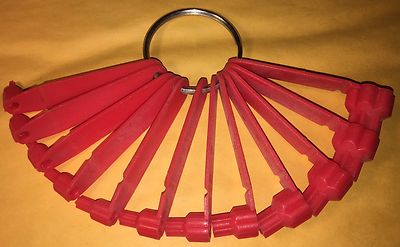 PLASTIC TORX IDENTIFIER SET ON A LARGE METAL RING IDENTIFIES TORX AND E-TORX  