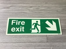 Image of Fire Exit Sign rigid plastic 450 x 150 Running Man Symbol with Directional Arrow