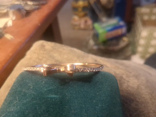 Bracciale con cerniera KATE SPADE New York tono oro rosa fiocco e cristallo impreziosito