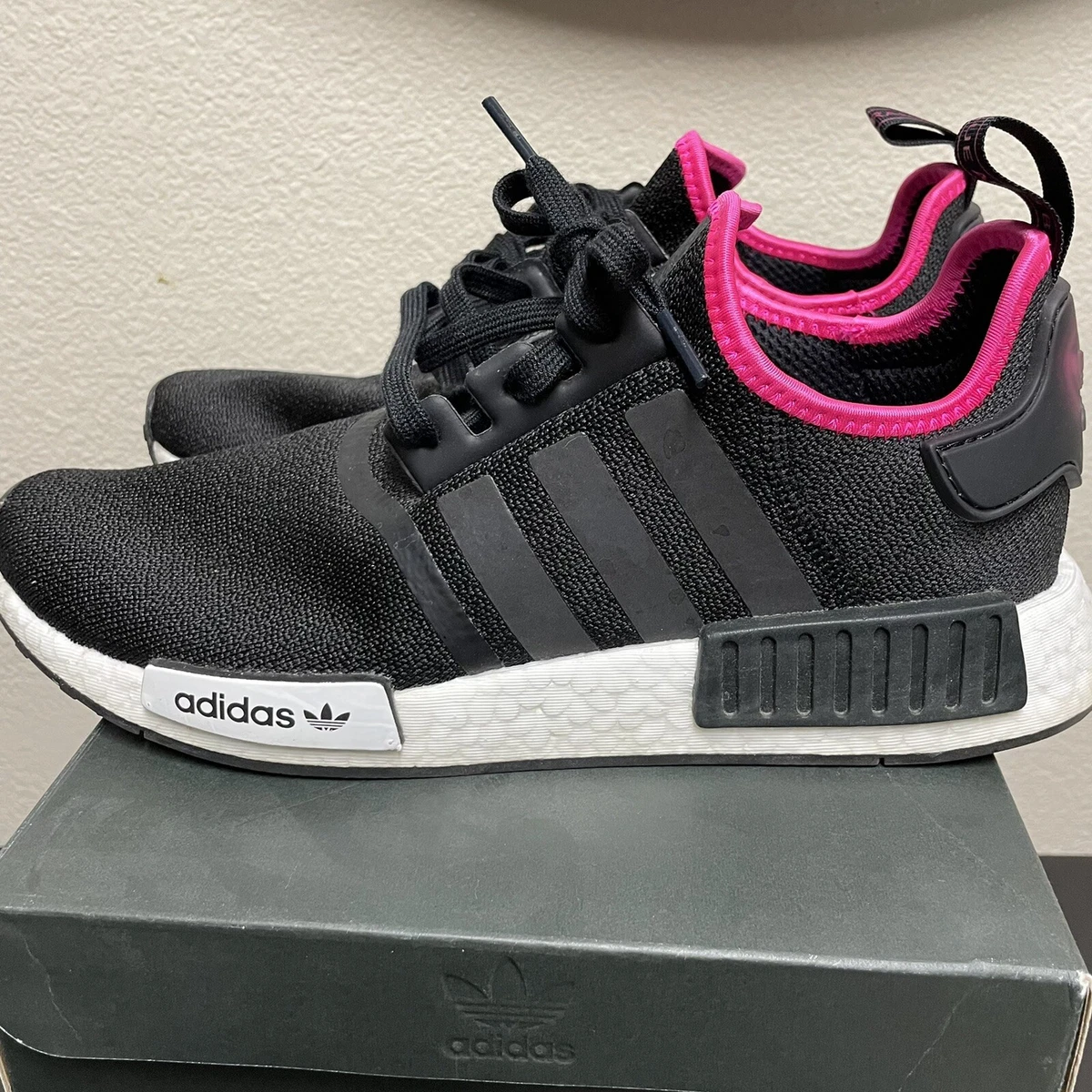 Adidas originals nmd cs primeknit shop trainers core black core black shock pink