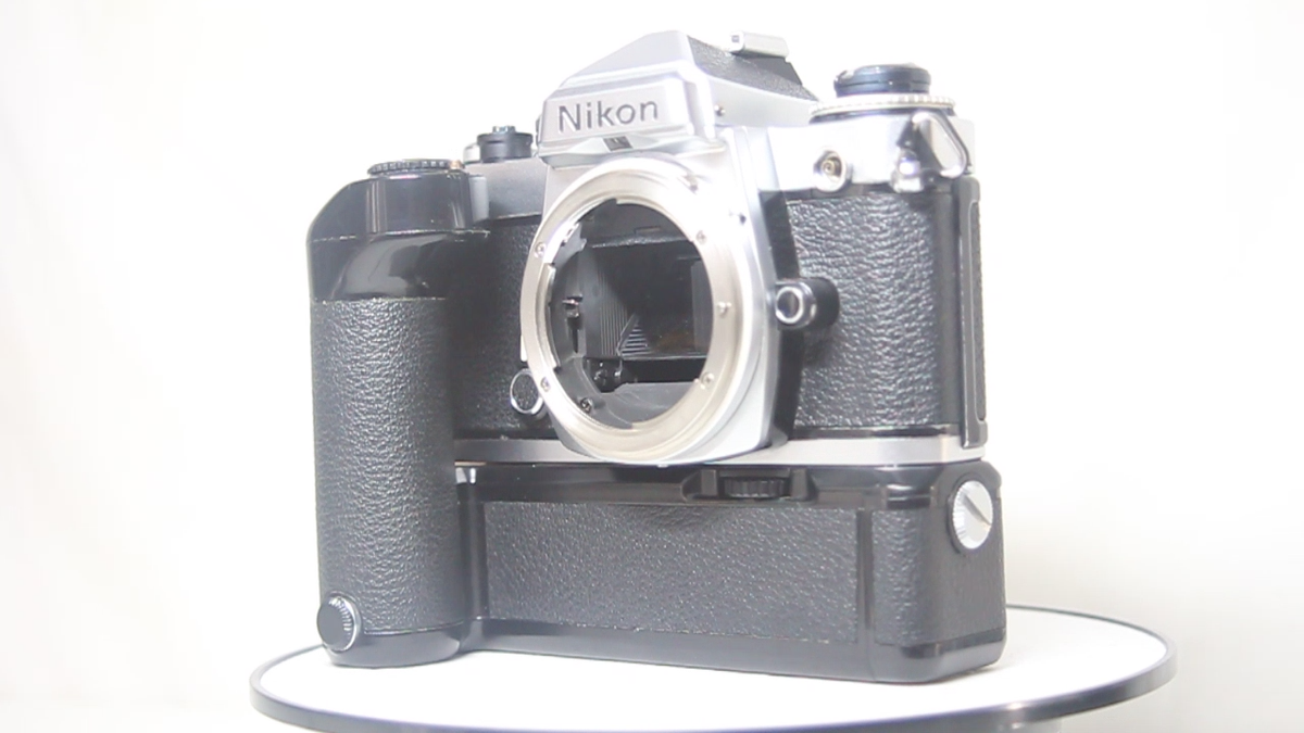 AS IS Nikon FE 35mm SLR Film Camera Silver Body + MD-12 Motor