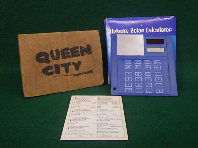 Vintage novelty floppy disk/diskette 3/5'' Solar Calculator w/sleeve