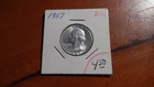 1957 silver washington quarter. bU