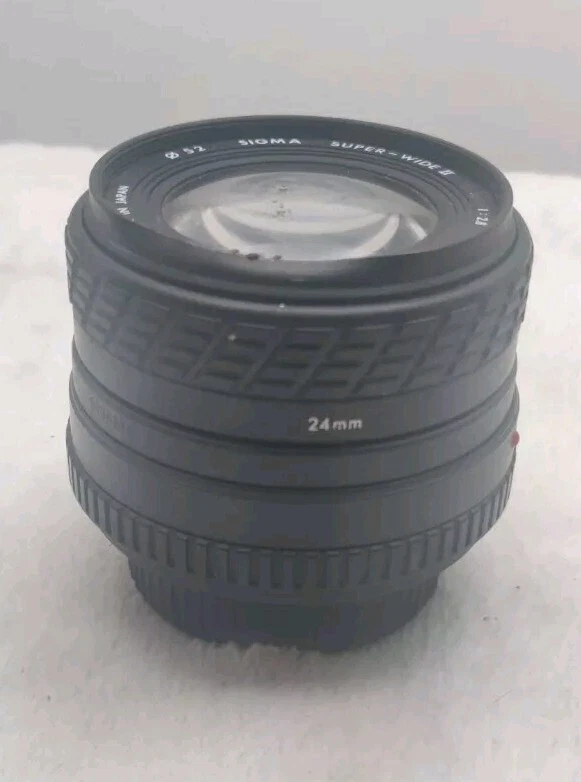Grand Angle Sigma Super-Wide II 2.8 24mm pour Minolta. Bord légèrement déformé.  - Photo 4/4