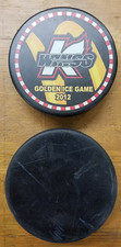Kalamazoo Wings Hockey Pucks - Golden Ice Game and Black Game Puck - Used 2012