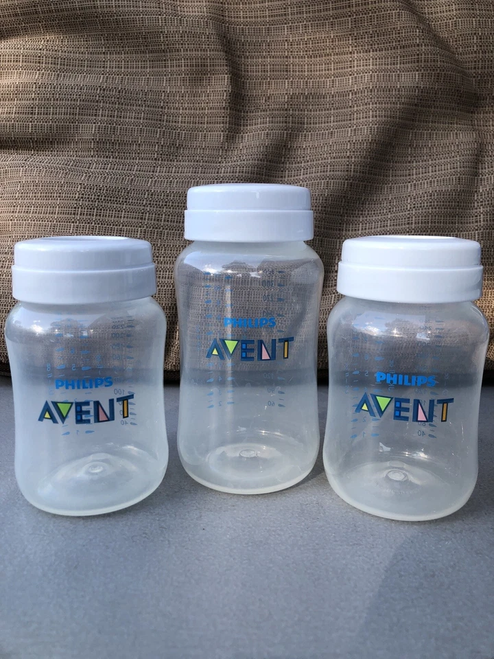 Lote de botellas Avent. (3) Botellas de 9 OZ y (1) Botella de 11 OZ. (5) Pezones nuevos. (1) Tapa Foto 2 de 4
