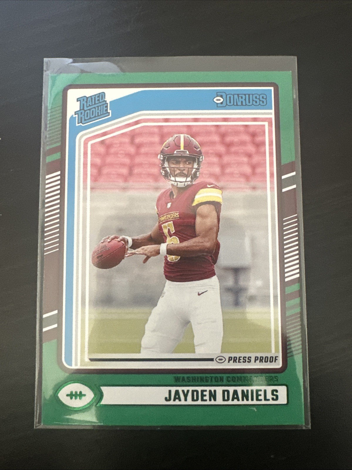 2024 Panini Donruss - Rated Rookie Jayden Daniels #389 Press Proof Green (RC)