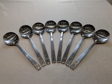 8 Carlyle CAMEO Stainless Steel spoons from Hong Kong.