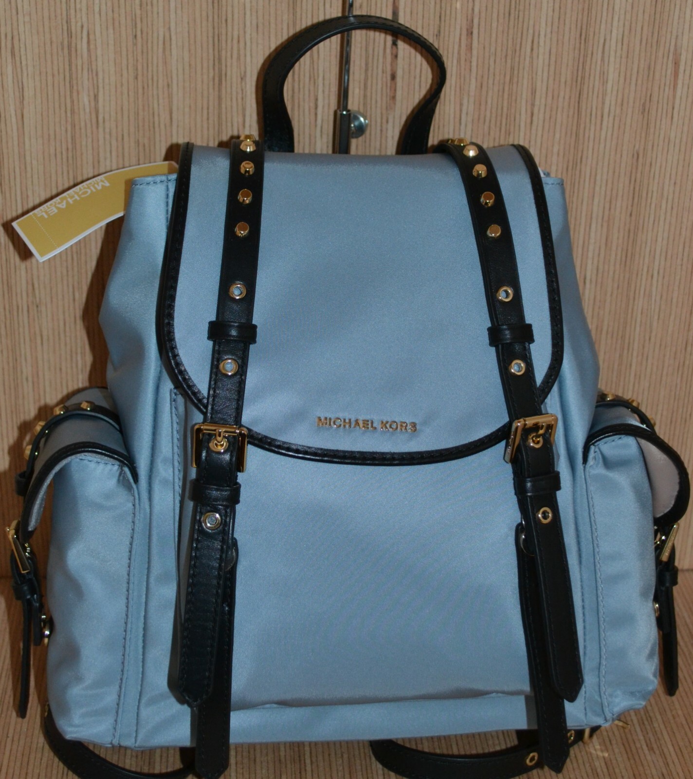 leila medium flap nylon backpack