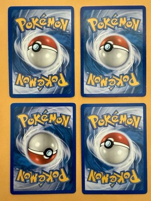 Four Different Multi Energy Cards from four different Pokémon Sets