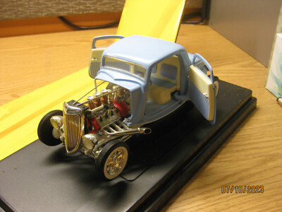 1/18 1934 FORD COUPE HOT ROD IN L.BLUE BY ERTL/AMERICAN MUSCLE