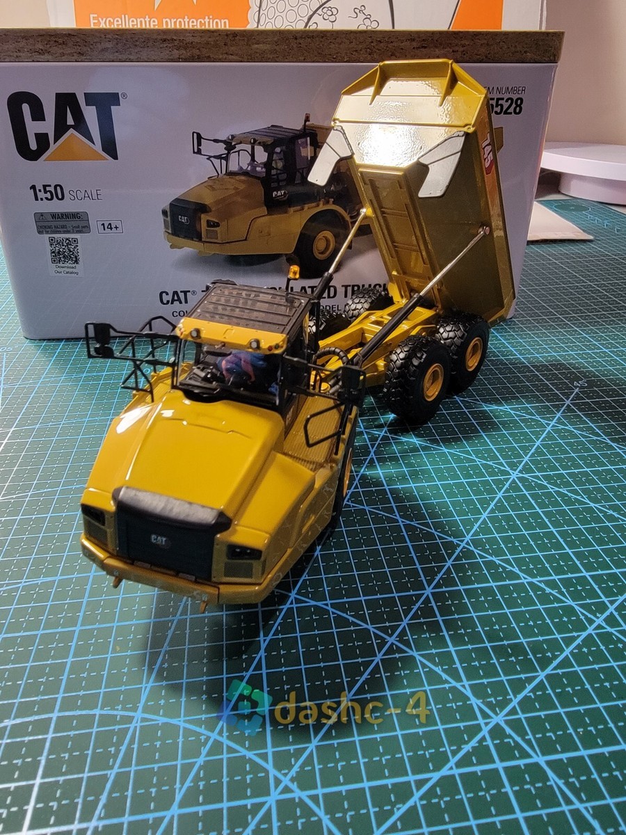 1/50 SCALE CATERPILLAR CAT 745 ARTICULATED TRUCK By DIECAST 1/50 SCALE CATERPILLAR CAT 745 ARTICULATED TRUCK By DIECAST