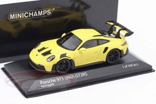 Porsche 911 (992) GT3 RS 2023 racing yellow / black rims 1:43 Minichamps