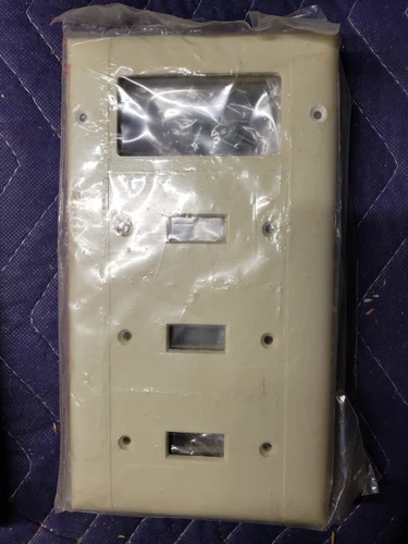 4 Gang Ivory Wall Plate 3 Toggle, 1 GFCI New With screws
