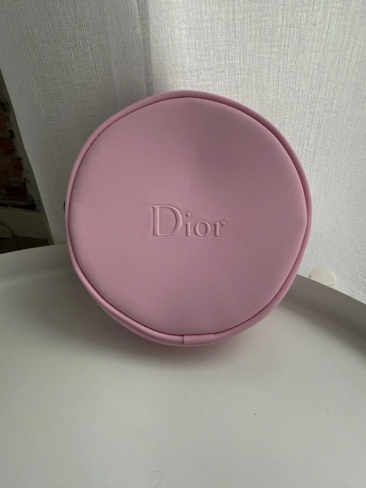 Jolie trousse ronde rose clair Dior Neuve