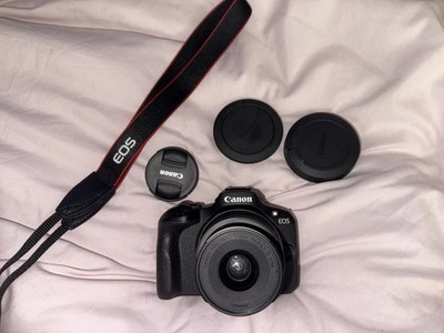 Canon EOS R100 DSLR 24.1MP w/18-45mm Lens, Strap, Caps, Built-In Flash